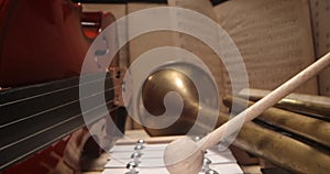 Musical instruments with sheet music on table