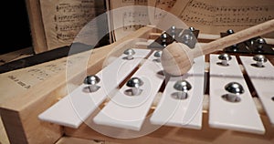 Musical instruments with sheet music on table. Music, musical instruments, orchestra, sheet music