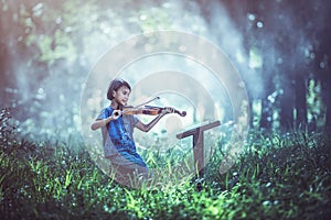 The musical: Little Asian child playing violin