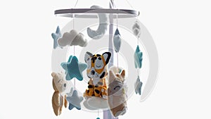Musical mobile for helping baby entertain and sleep in crib
