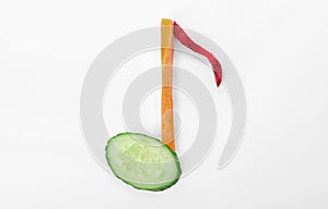 Musical note made of vegetables on white background