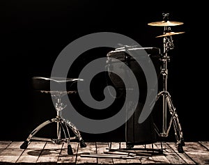 musical percussion instruments on black background