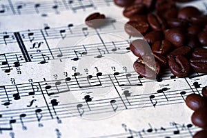 Musical score with coffee beans on it