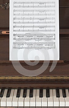 Musical score and piano