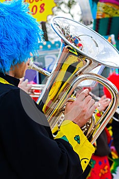 Musician clown playing tuba photo