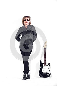 Musician dressed in black leather on white background