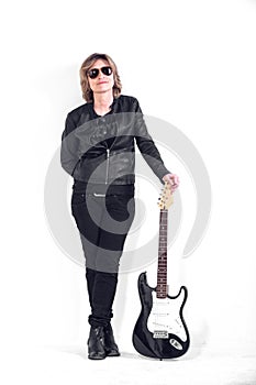 Musician dressed in black leather on white background