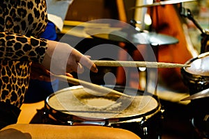 Musician drummer playing the drums