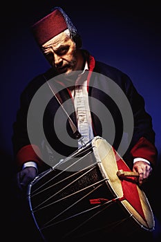 Musician With Fez And Tapan Drum