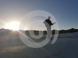 Musician guitar beach music sand sunrise