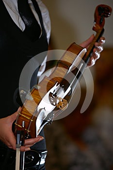 Musician is holding violin