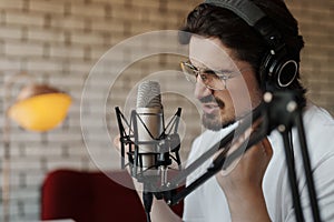 Musician Immersed in Recording a Soulful Track