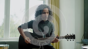 Musician Male Enjoy Playing Guitar .