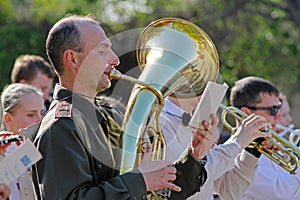 Musician in military uniform with trumpet takes part in Victory day event in Volgograd