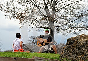 Musician performing in Zilker Metropolitan Park, Austin