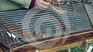 Musician play on traditional cimbalom. Traditional musical instrument