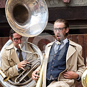 Musician playing big tuba.