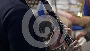 Musician playing the clarinet, closeup