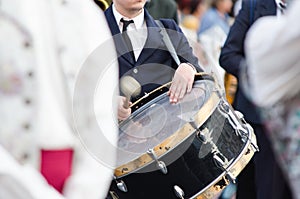 Musician playing the drum in the Festival of the fallas of Valencia photo