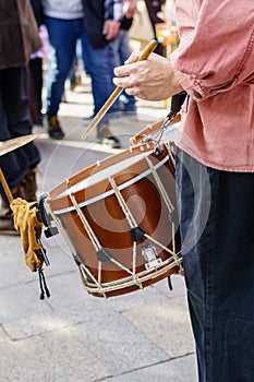 Musician playing the drum during a traditional medieval folklore festival