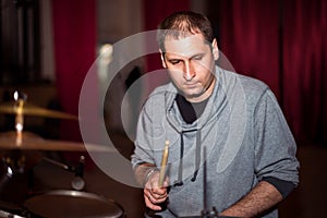 Musician playing drums on stage