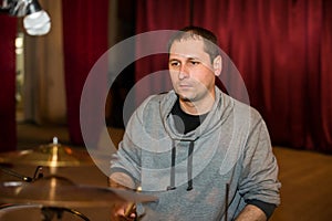 Musician playing drums on stage