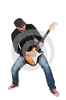 Musician playing electric guitar with enthusiasm. Isolated on white photo