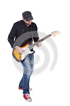 Musician playing electric guitar with enthusiasm. Isolated on white