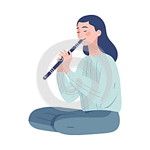 Musician playing flute, isolated on flat backdrop