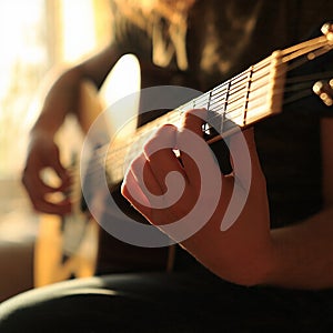 musician playing the guitar