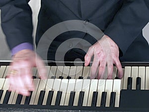 Musician playing hammond organ