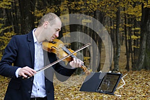 Musician playing at instrument