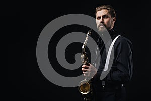 Musician playing jazz on saxophone