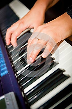 Musician playing on keyboards