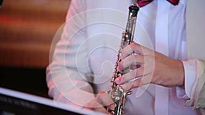 Musician playing the oboe
