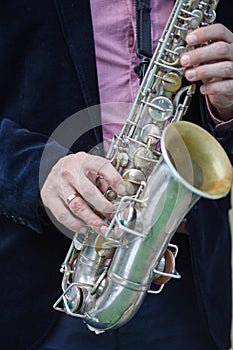 Musician playing the trumpet at a wedding