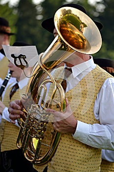 Musician plays the instrument Baritone