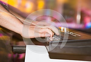 Musician plays keyboards in a rock band