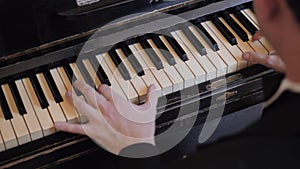 A musician plays the piano.