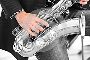 Musician plays saxophone