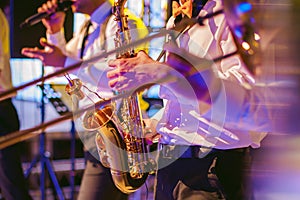 Musician plays the saxophone performance