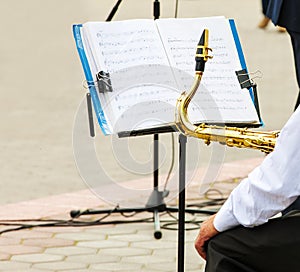 The musician plays the trumpet in the city orchestra.