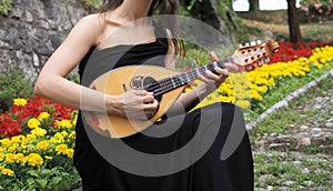 Musician posing with italian mandolin