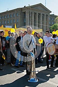 Musician with trumpet takes part in the May day demonstration in Volgograd