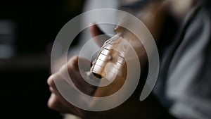 Musician Tuning a guitar in studio.