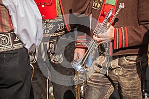 Musician in typical  costume during an autumn local celebration in Val Isarco  South Tirol