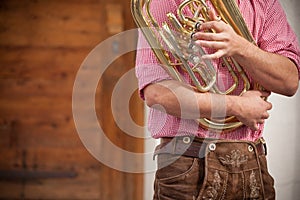 Musician in typical costume during an autumn local celebration in Val Isarco  South Tirol