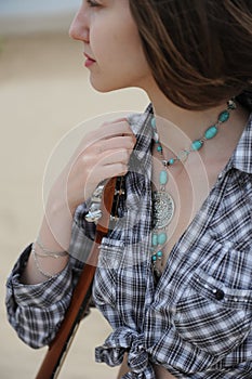 Musician woman and her guitar in good day