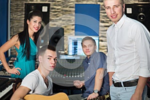 Musicians in the Recording Studio with equipment