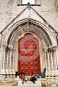 Musicians resting at the door of Convento do Carmo in Lisbon